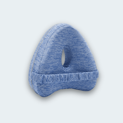 KneeFit knee pillow in blue with elastic strap and central cut-out