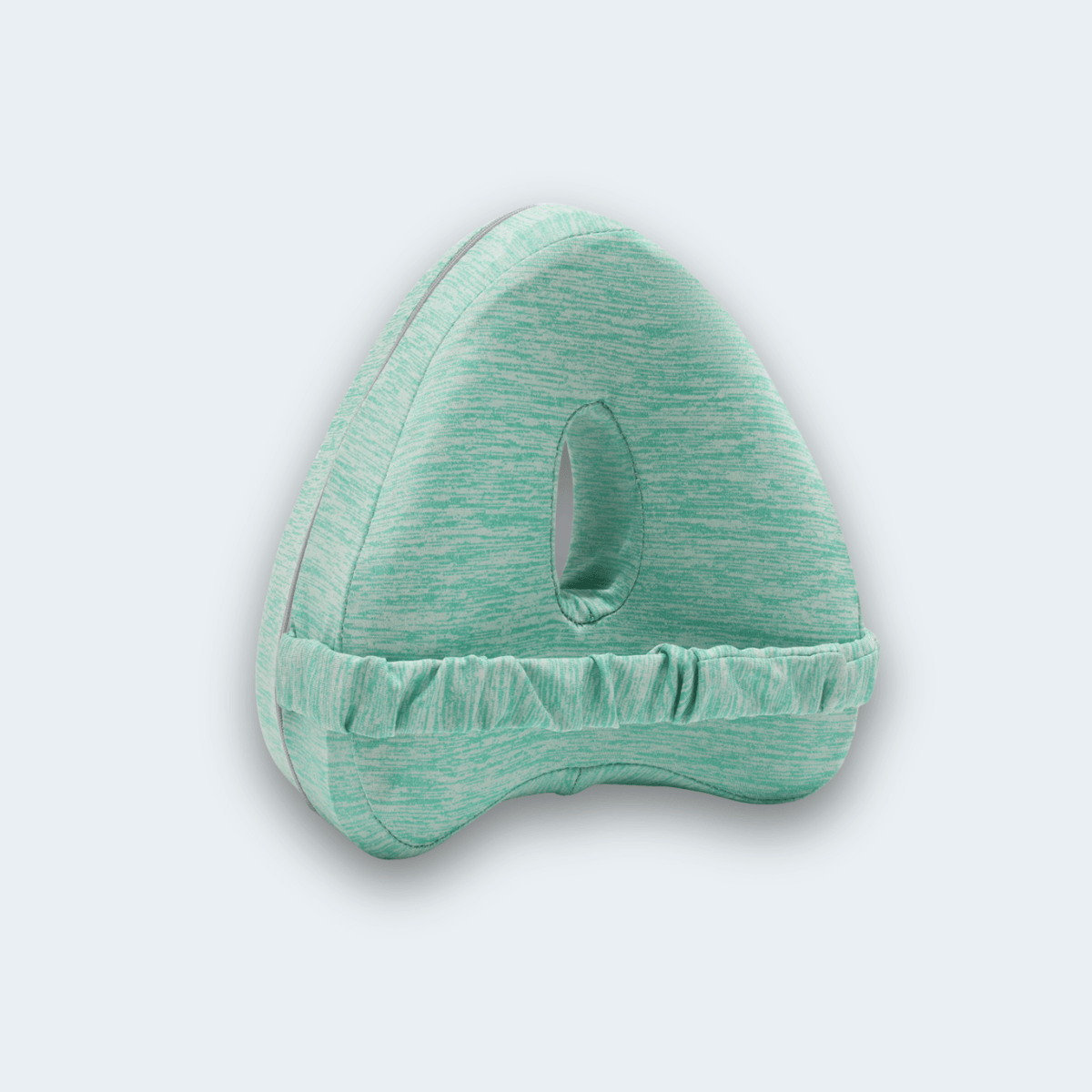 KneeFit knee pillow in green with elastic strap and central cut-out
