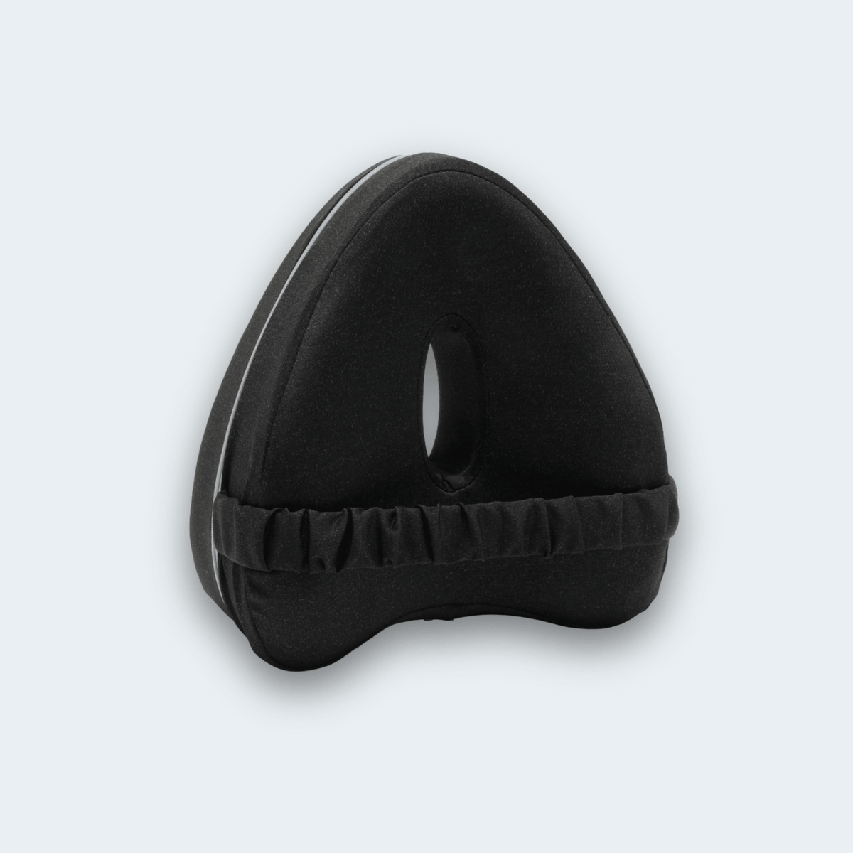 KneeFit knee pillow in black with elastic strap and central cut-out