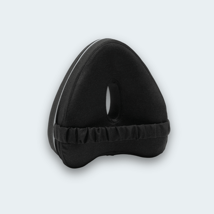 KneeFit knee pillow in black with elastic strap and central cut-out